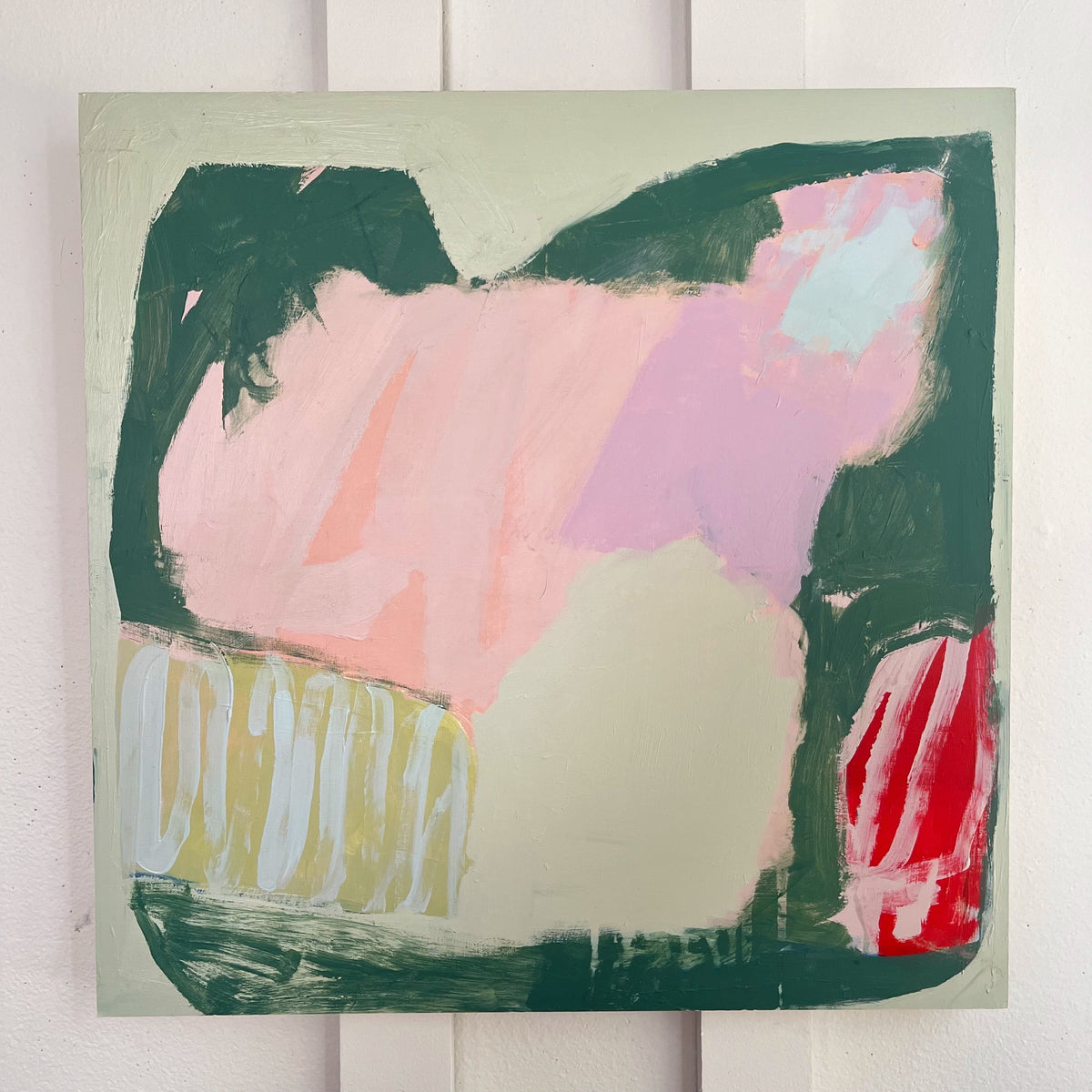 Sorry, Lost My Train of Thought — abstract pink, lavender, cream, and red shapes within sweeping dark green marks. Painting by Maggie Stickney.