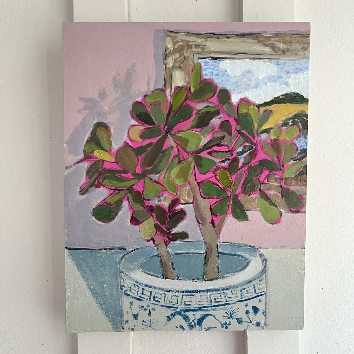 Jade in a Fancy Pot — a jade plant edged in pink in a blue-and-white patterned pot. Painting by Maggie Stickney.