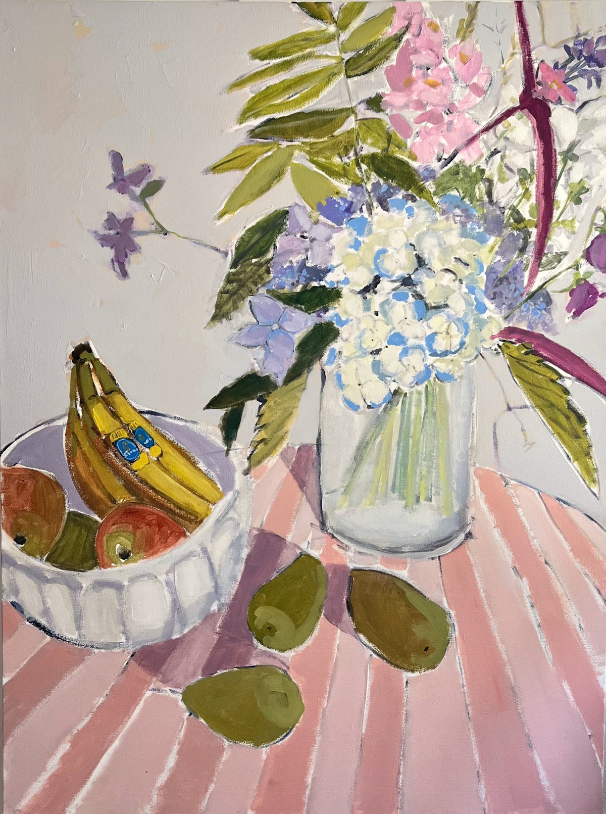 Pears and Hydrangeas — hydrangeas in a glass vase beside pears and a fruit bowl on a pink-striped table. Painting by Maggie Stickney.